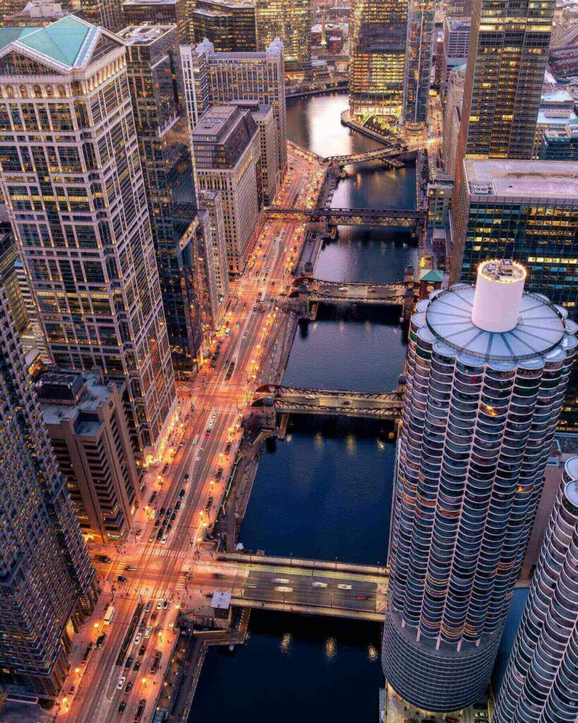 Chicago Riverwalk with boats and downtown skyline