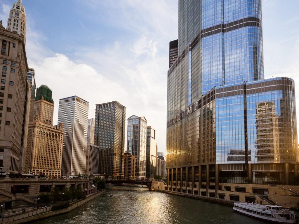 Chicago Riverwalk with reflections of Trump Tower and nearby skyline