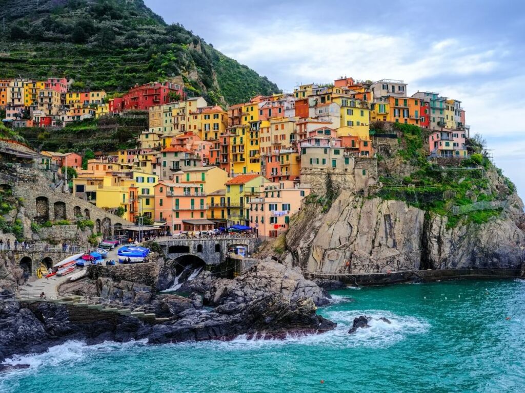 Colorful cliffside villages of Cinque Terre Italy overlooking the Mediterranean Sea


