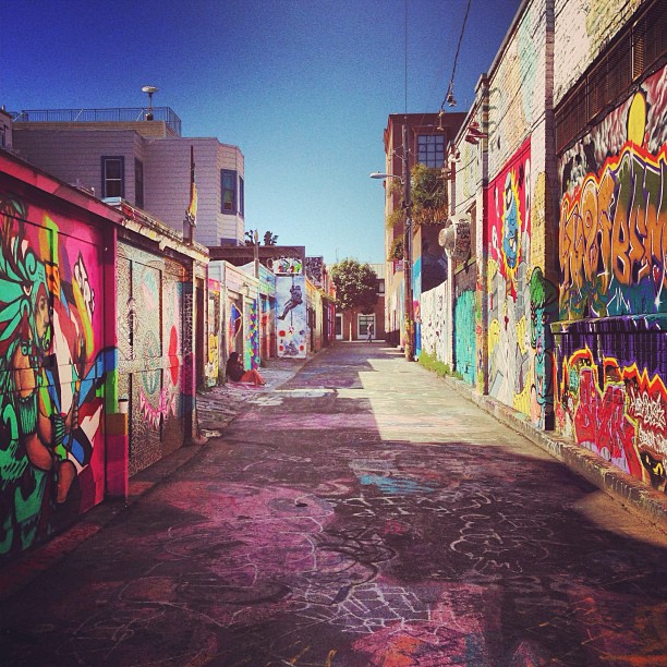 colorful street art murals covering the walls of Clarion Alley in San Francisco