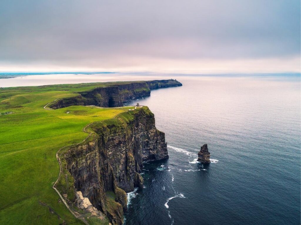 Dramatic coastal cliffs rising from the Atlantic Ocean at the Cliffs of Moher, Ireland