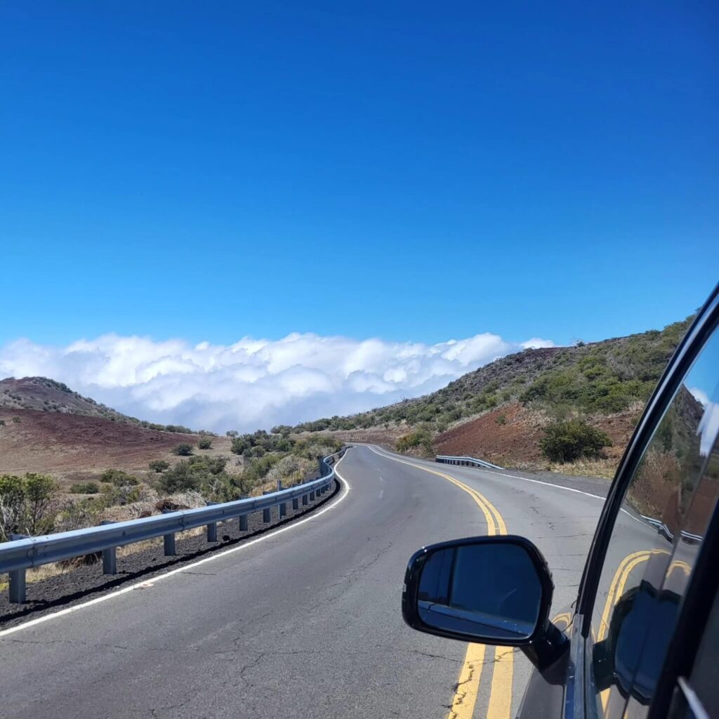 Scenic drive along the Big Island showing volcanic landscapes and coastal views