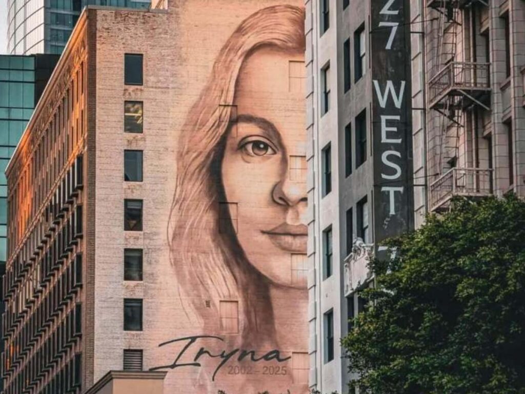 Large colorful murals on warehouse buildings in the Downtown LA Arts District