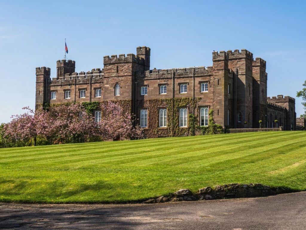 Dunrobin Castle overlooking formal gardens and the North Sea in Scottish Highlands