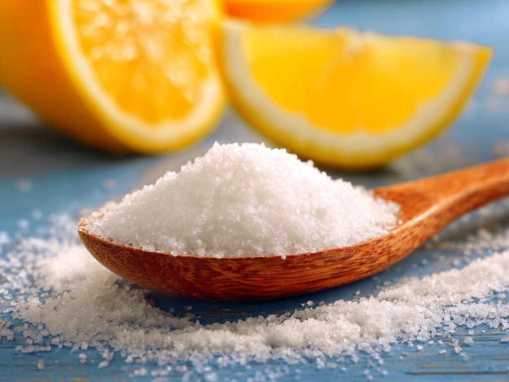 Baking soda sprinkled inside suitcase to eliminate odors naturally