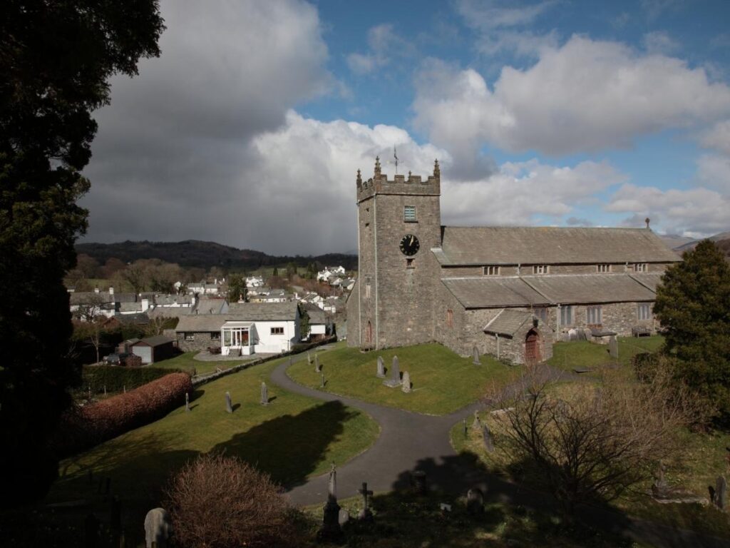 Whitewashed buildings in car-free Hawkshead village, Lake District