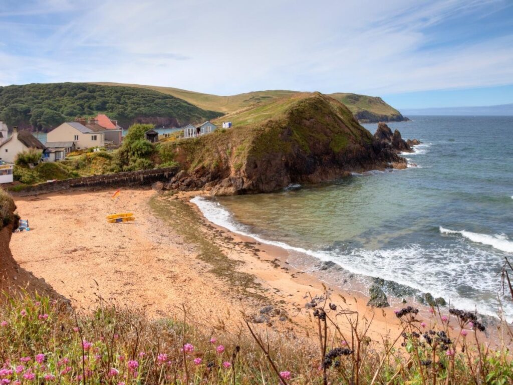 Sandy beach and turquoise waters at Hope Cove, South Devon