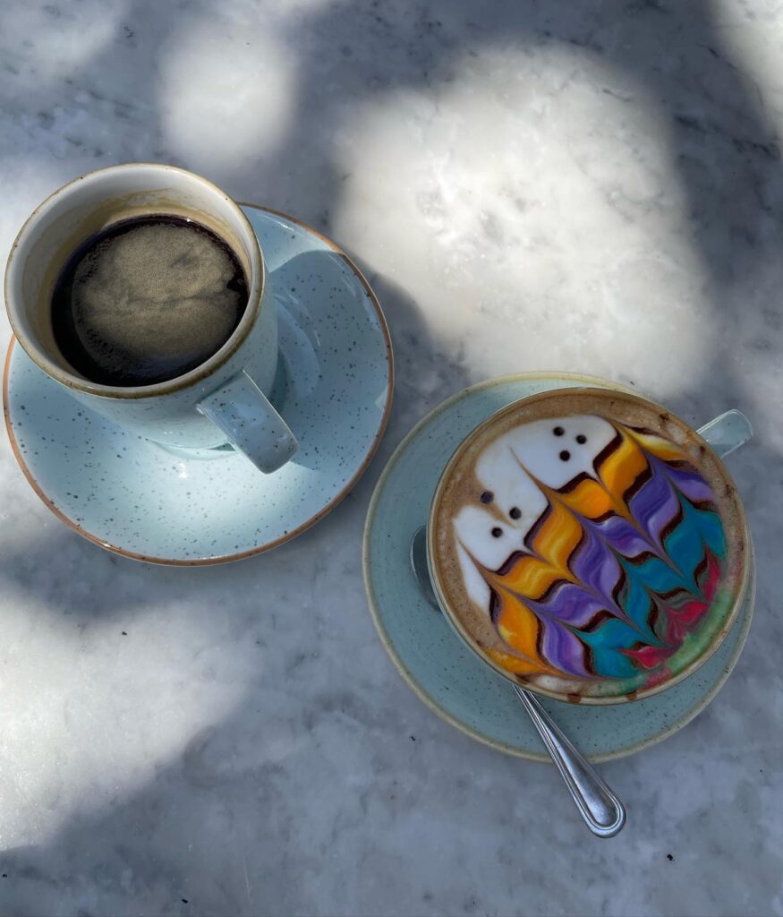 Colorful latte art served at Butcher Baker Cappuccino Maker cafe in West Hollywood