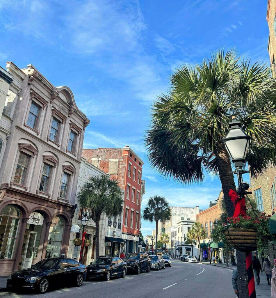 King Street in Charleston with historic storefronts and palmetto trees