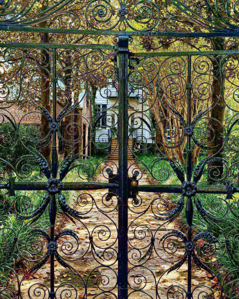 Ornate iron gates and gardens on Legare Street in Charleston