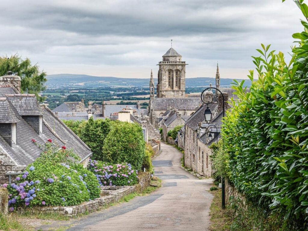 Renaissance granite houses surrounding main square in Locronan village Brittany