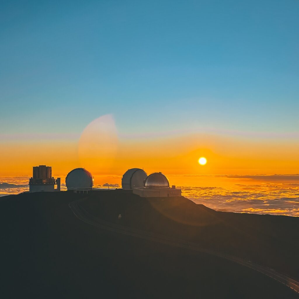 Sunset above the clouds from Mauna Kea Summit on the Big Island