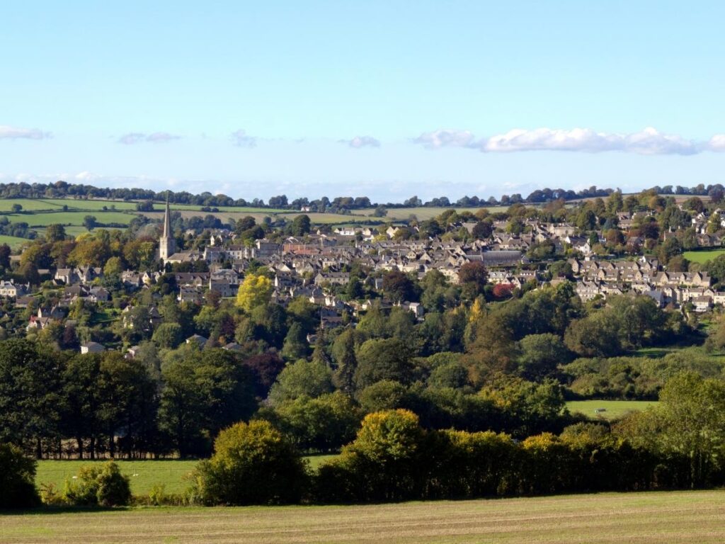 Stone houses on hillside streets in Painswick village, Gloucestershire