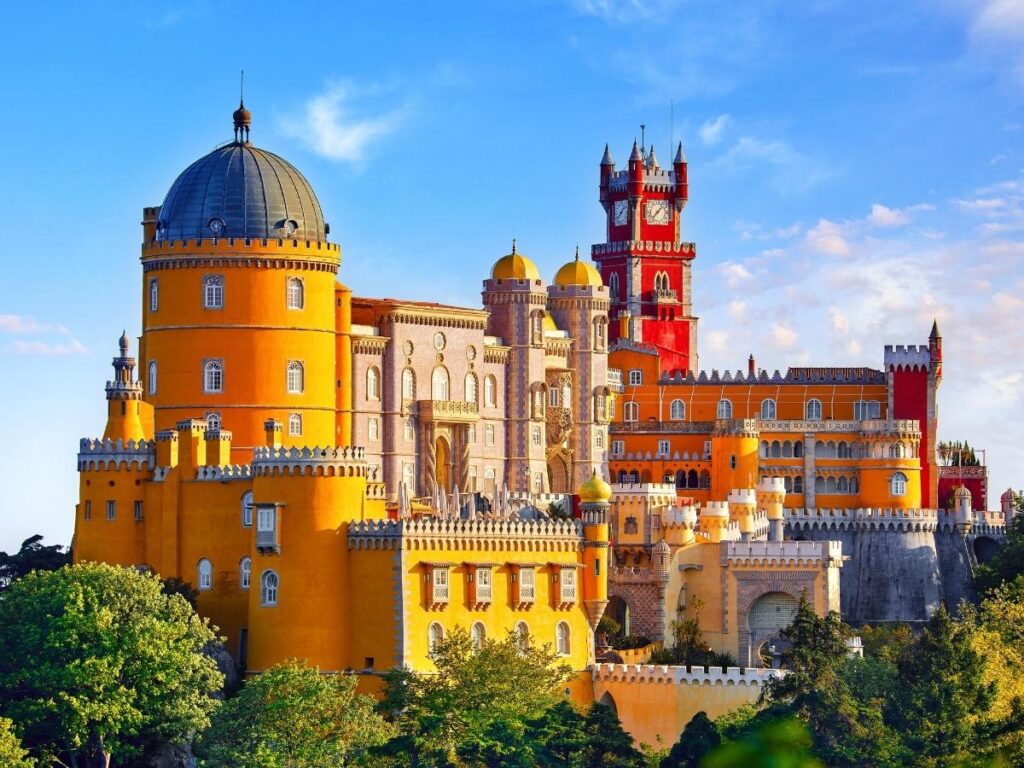 Colorful yellow and red Pena Palace with romantic towers in Sintra, Portugal
