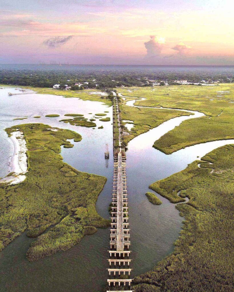 Pitt Street Bridge overlooking marsh grasses at sunset near Charleston