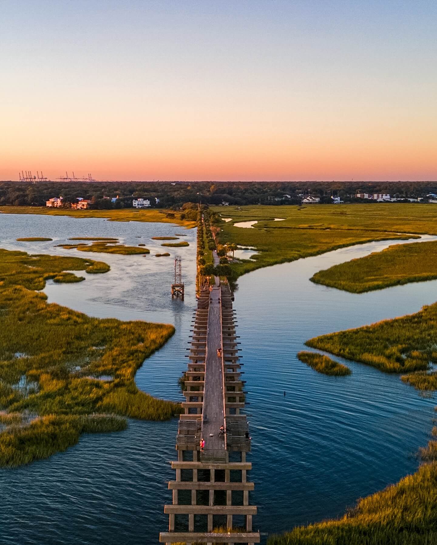 Sunset view over marsh grasses from Pitt Street Bridge in Mount Pleasant near Charleston