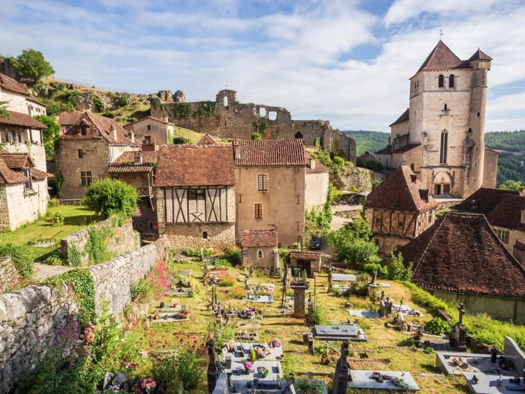 Saint-Cirq-Lapopie perched on cliff above Lot River in Aveyron France