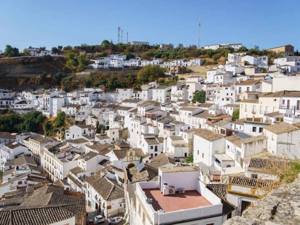White houses built under rock overhangs in Setenil de las Bodegas Spain