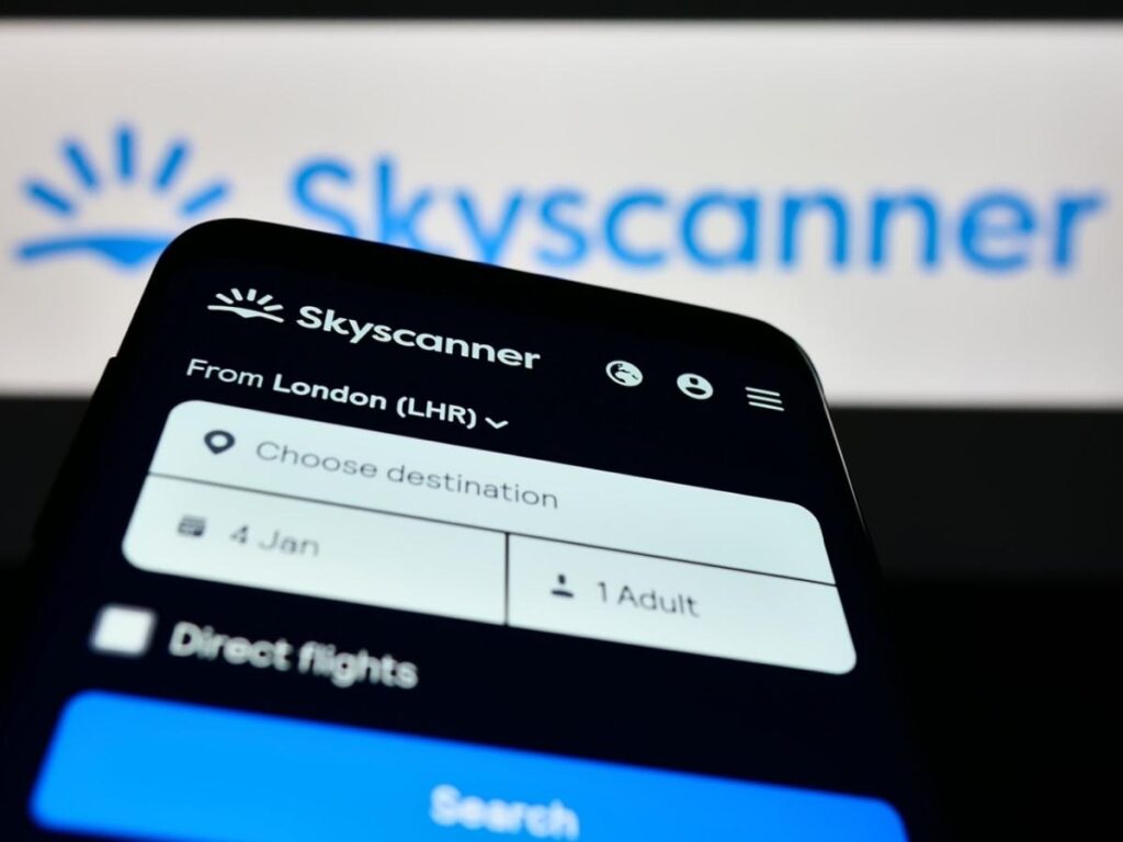 Skyscanner app interface showing cheap flight search results on smartphone
