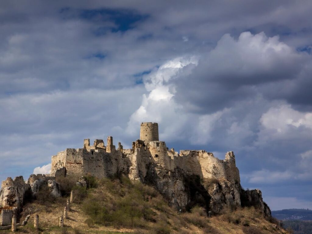 Hungarian Parliament building illuminated at sunset along Danube River Budapest