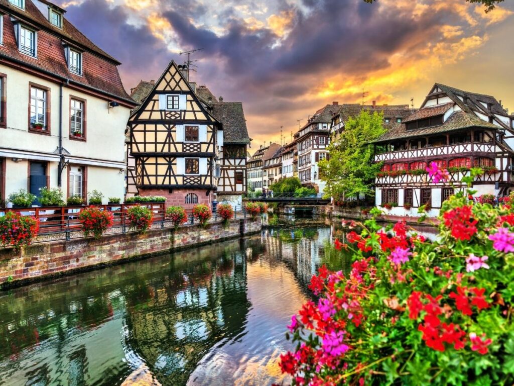 Colorful half timbered houses and canals in La Petite France neighborhood Strasbourg Alsace
