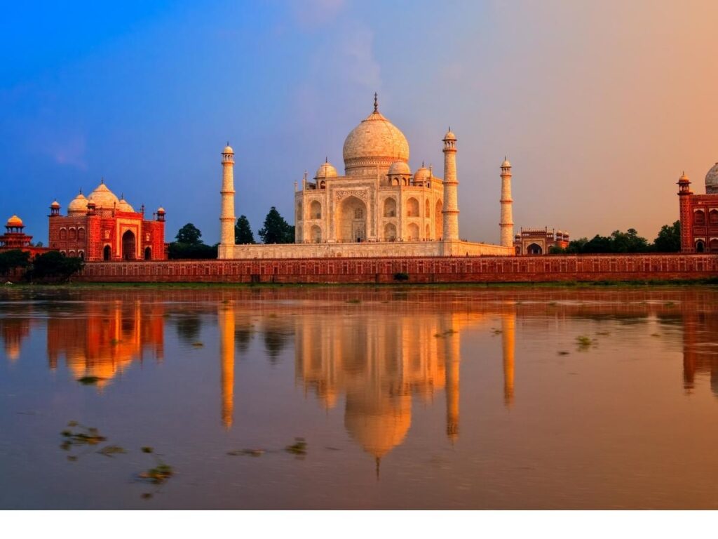 Taj Mahal white marble monument at sunrise in Agra India