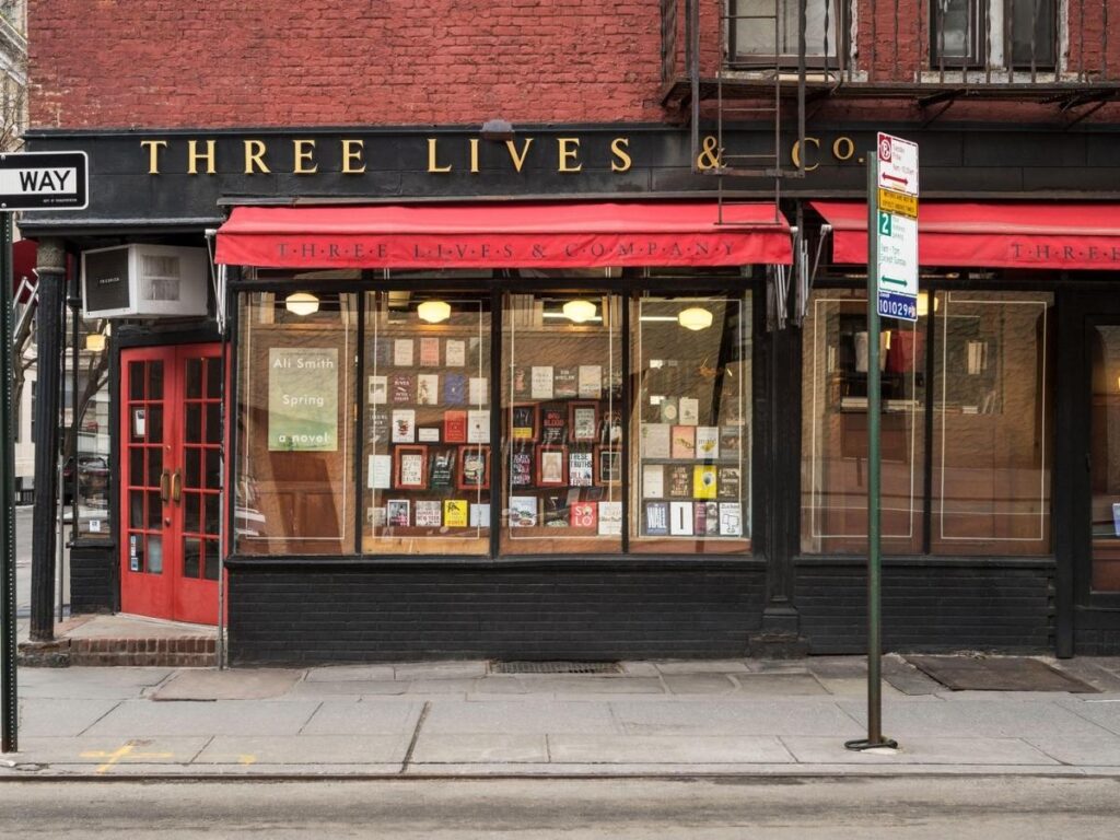 Cozy interior of Three Lives & Company bookstore with wooden floors in Greenwich Village