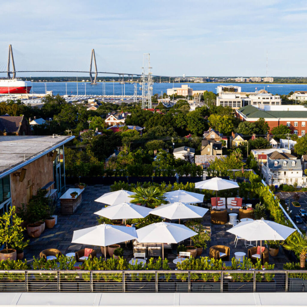Panoramic rooftop view of the Charleston historic district and harbor