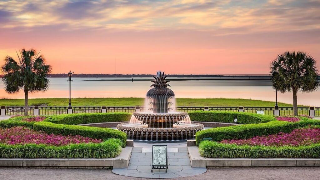 Sunrise over Charleston Harbor from Waterfront Park with the Ravenel Bridge in the distance