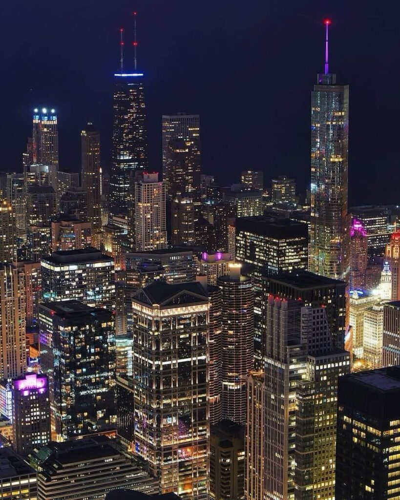 View from Willis Tower Skydeck ledge overlooking downtown Chicago