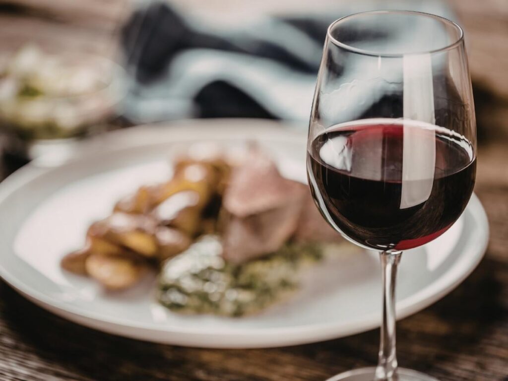 Air France first class in-flight meal featuring French gourmet cuisine and curated wine selection