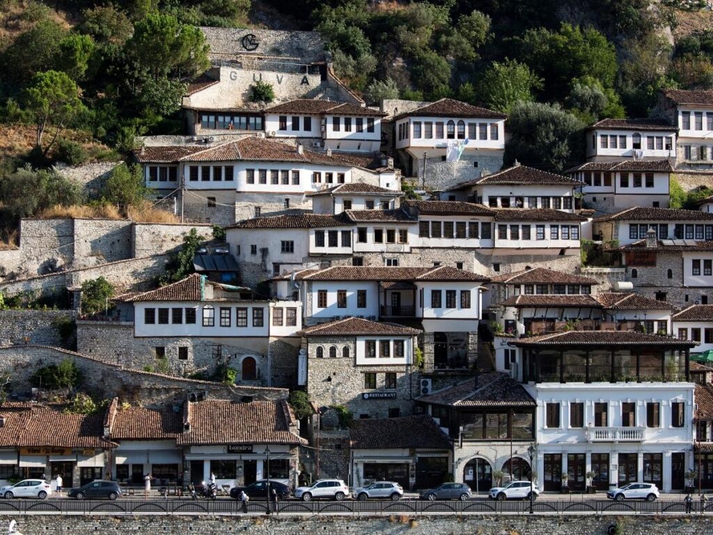 The hillside Ottoman town of Berat Albania with its rows of white houses and hundreds of windows stacked up the slope