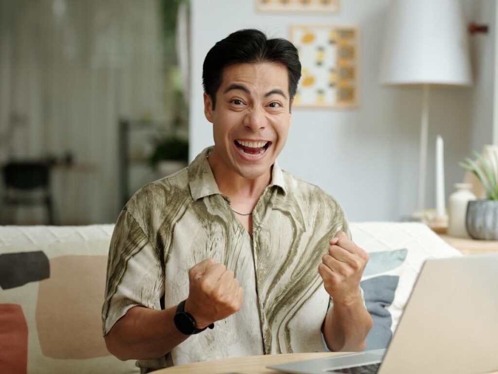 Person booking a cruise deal online during holiday sale season
