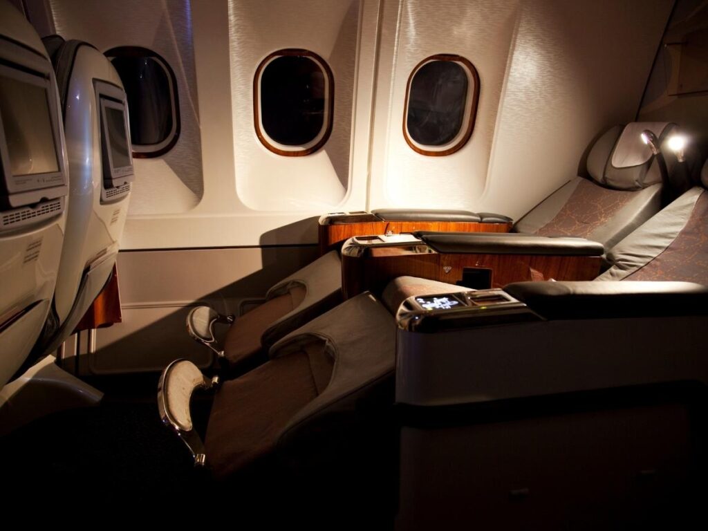 Fully reclined business class flat bed seat on a long-haul overnight international flight