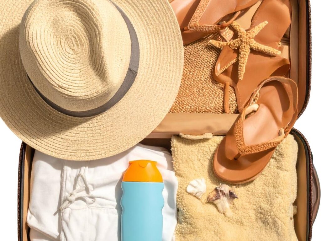 Collapsible silicone water bottle packed in travel luggage for hotel stays