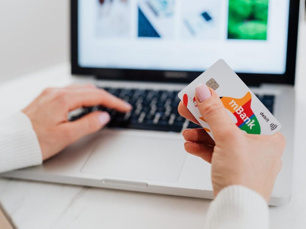  Credit card bank portal on a laptop screen showing the transfer points to airline partner option