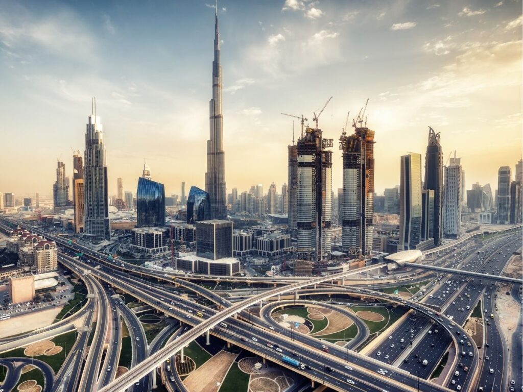 Dubai skyline with Burj Khalifa at sunset showing modern architecture and traditional culture