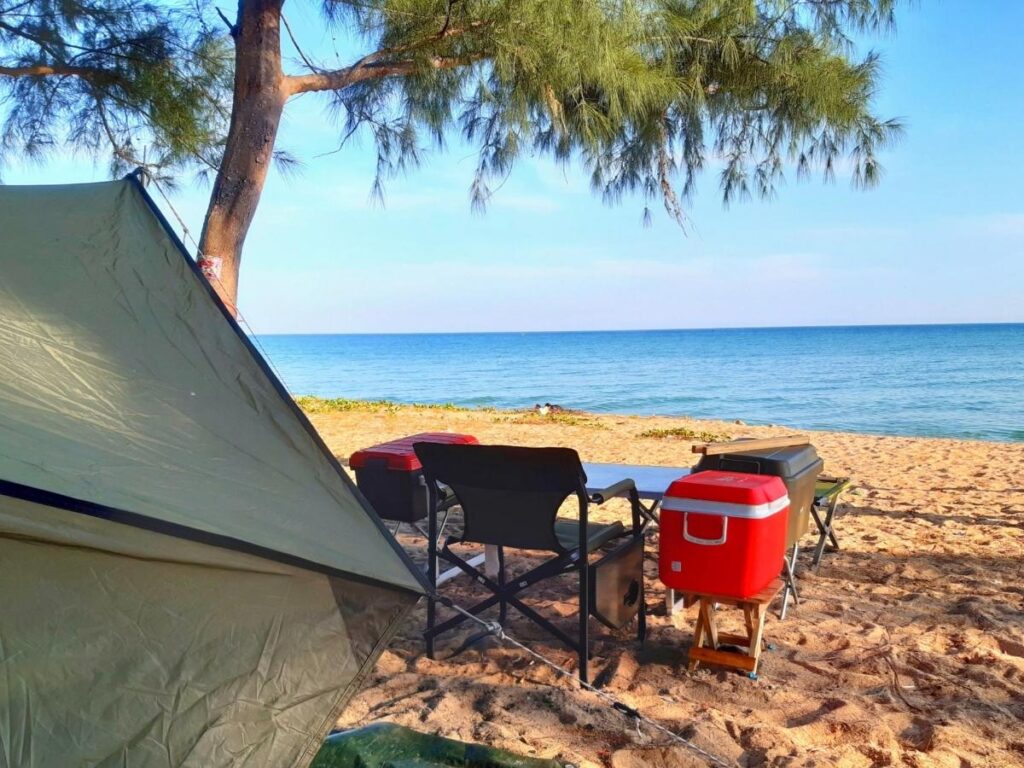 Beachfront camping site at Hawaii state park with tent and ocean view
