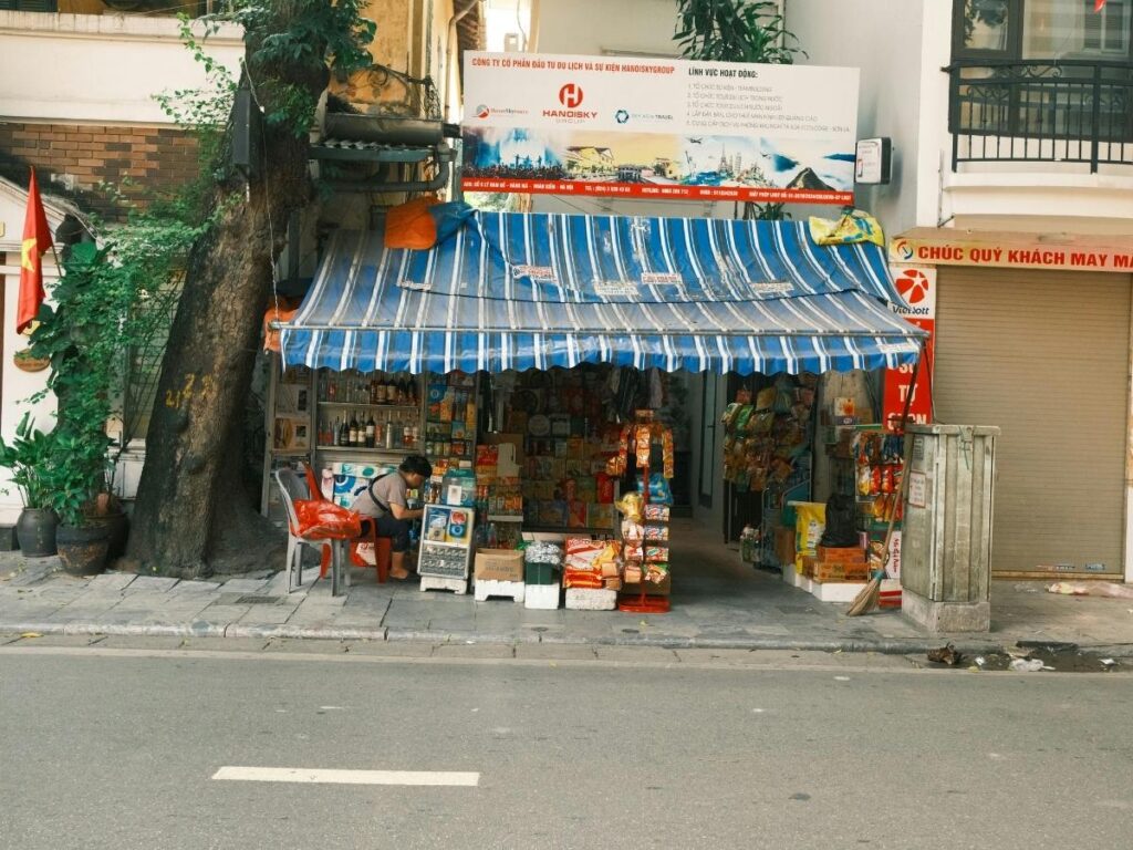 Small grocery store and quiet street in a Costa Rica town on a sunny weekday morning