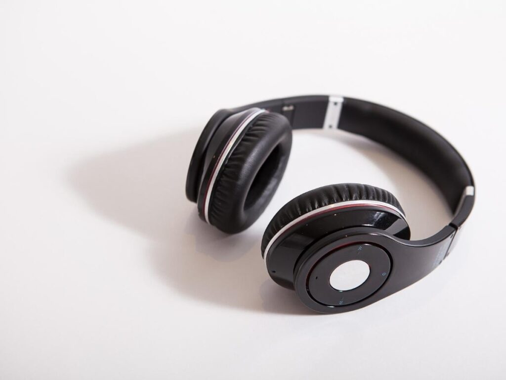 Sony noise-canceling headphones on airplane tray table