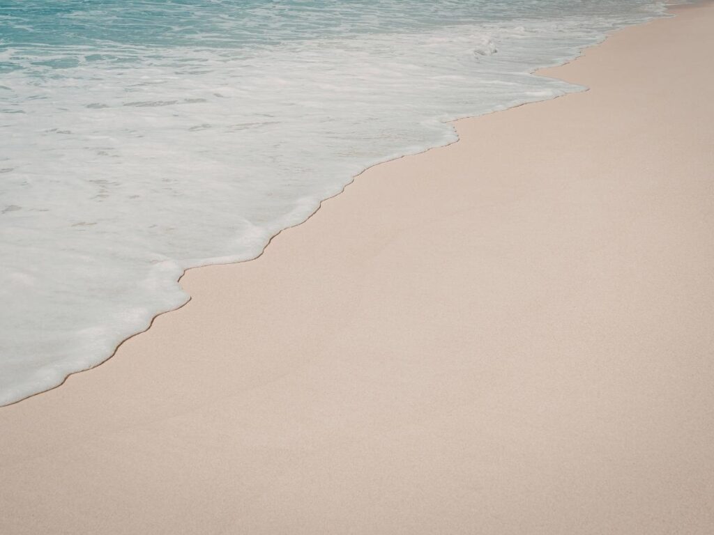 Peaceful shoreline and wide sandy beach at Sandbridge Beach, Virginia