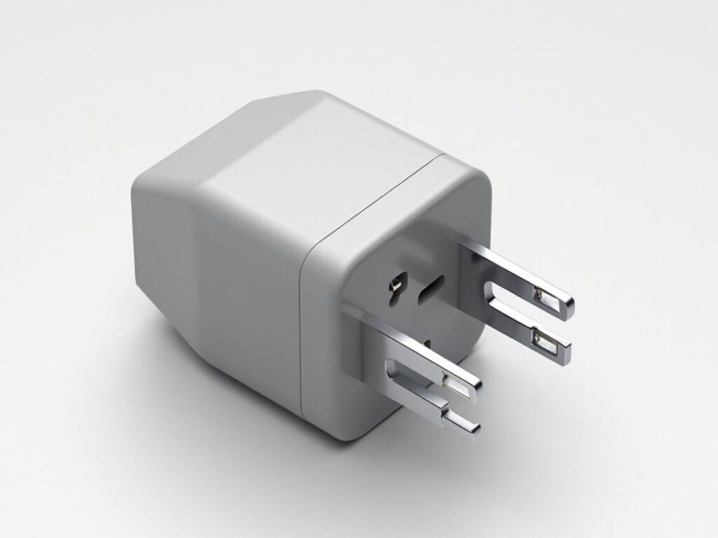 Epicka universal travel adapter plugged into wall charging multiple devices