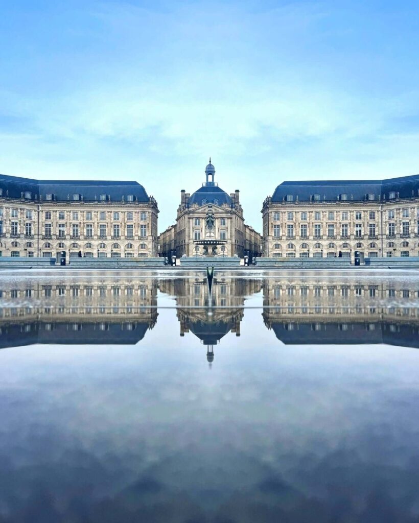 Bordeaux city streets near the river with historic buildings and soft evening light