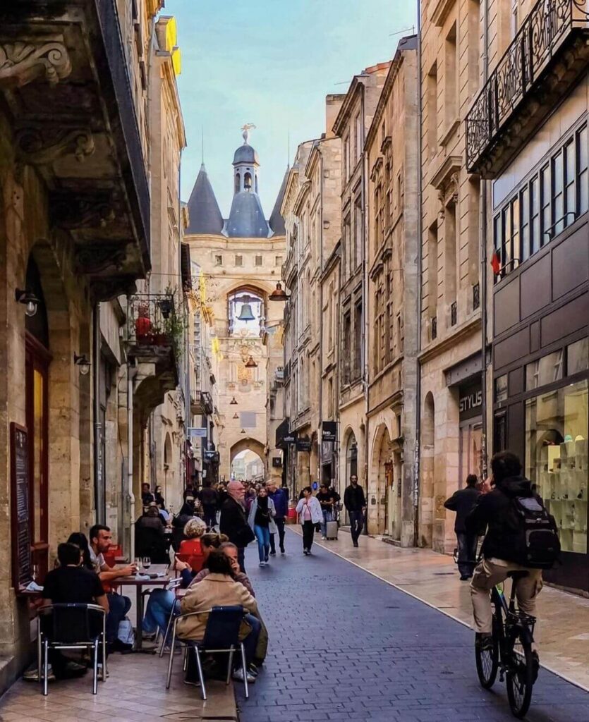 Historic streets of Bordeaux old town with cafes and stone buildings