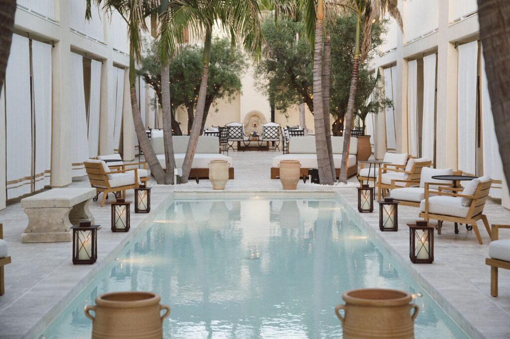 Cara Hotel courtyard pool with Mediterranean design in Los Angeles