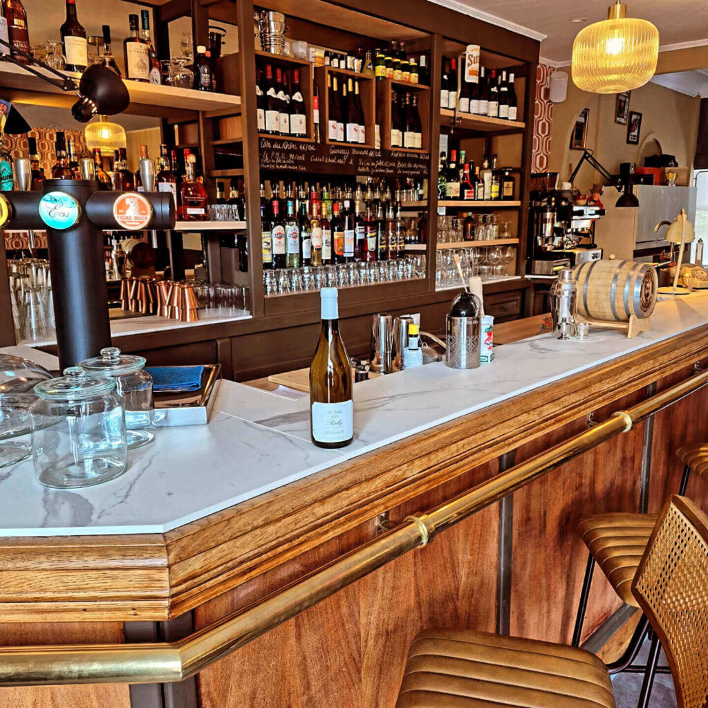 Cozy wine bar in Dijon during the evening with warm lighting