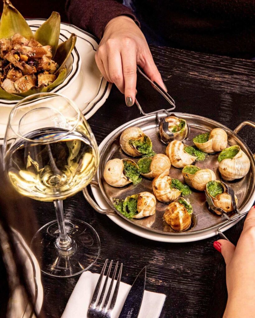 Escargots served with garlic butter in a Dijon restaurant