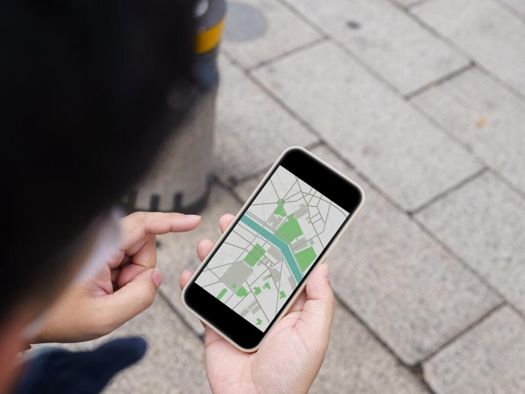 Google Maps offline download screen on a smartphone showing a city map area selected for download before travel