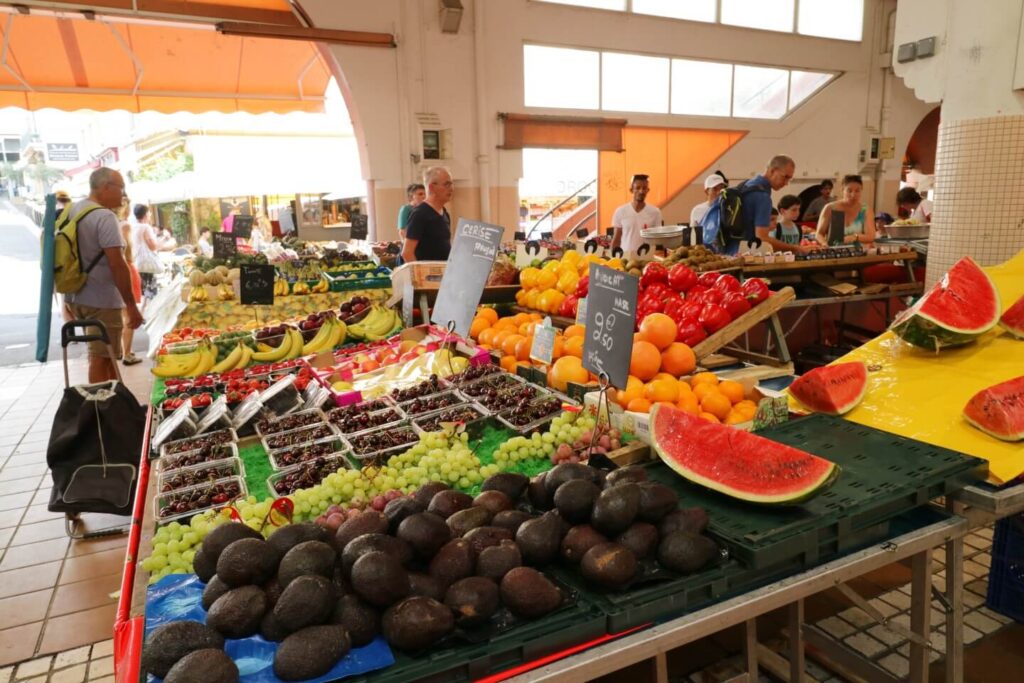 Fresh food stalls inside Marché Forville market in Cannes