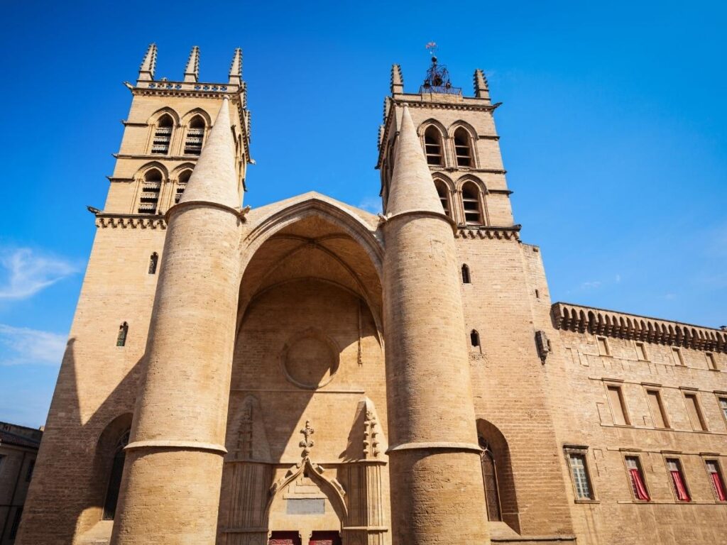Montpellier Cathedral entrance with large stone pillars